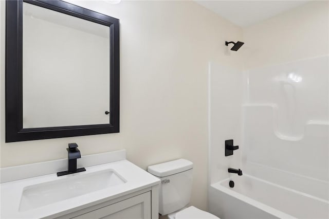 full bath with toilet, shower / washtub combination, and vanity