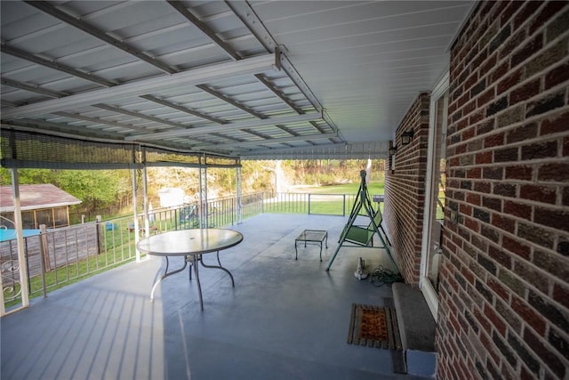 view of patio / terrace featuring fence