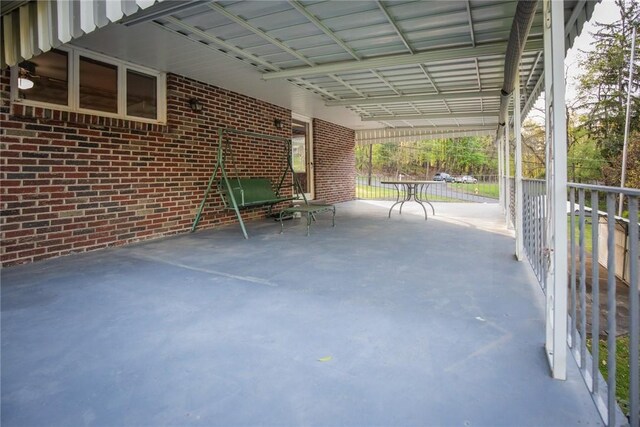 view of patio featuring an attached carport