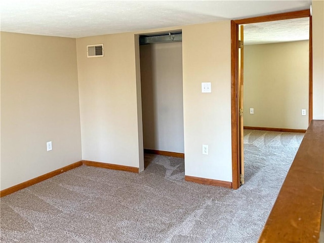 478 Spang Ave, Leechburg Boro, PA 15656 - unfurnished room featuring visible vents, a textured ceiling, baseboards, and carpet floors