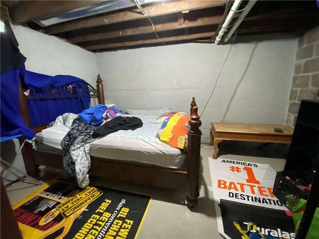 bedroom with concrete flooring