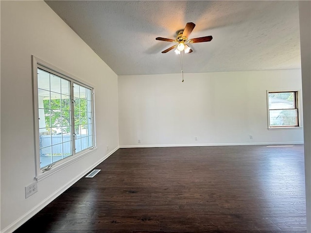 9 E Ridge Ave, Greenville Boro Mer, PA 16125 - empty room with a textured ceiling, dark wood-style floors, a ceiling fan, and baseboards