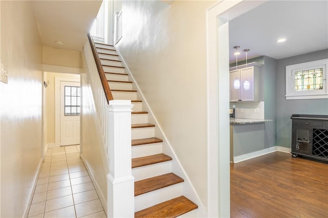 3361 Portola Ave, Observatory Hill, PA 15214 - stairs with healthy amount of natural light, wood finished floors, and recessed lighting