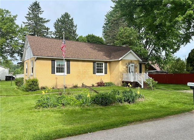 310 Church St, Harrisville Boro, PA 16038 - view of front of home with brick siding and a shingled roof
