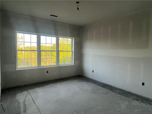330 Cherokee Dr, Chippewa Twp, PA 15010 - empty room featuring plenty of natural light and concrete flooring