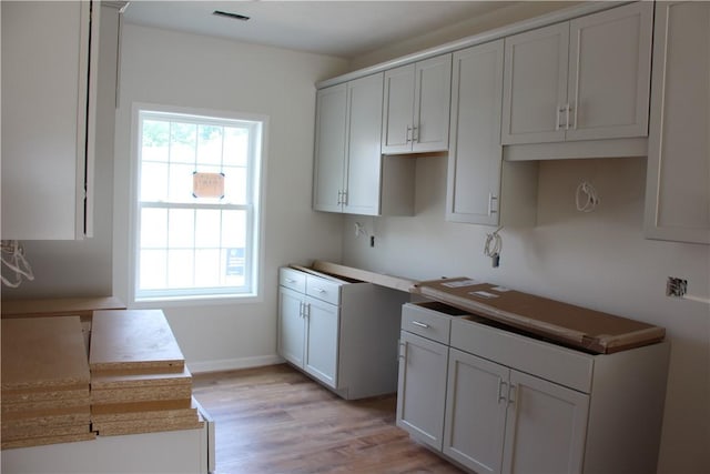 330 Cherokee Dr, Chippewa Twp, PA 15010 - kitchen with light wood-type flooring and baseboards