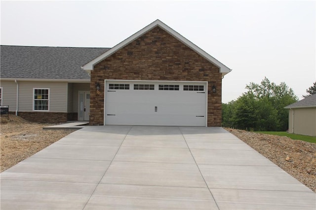 330 Cherokee Dr, Chippewa Twp, PA 15010 - craftsman-style home with stone siding, driveway, a garage, and a shingled roof