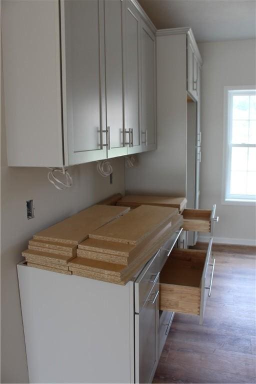 330 Cherokee Dr, Chippewa Twp, PA 15010 - kitchen with wood finished floors and baseboards