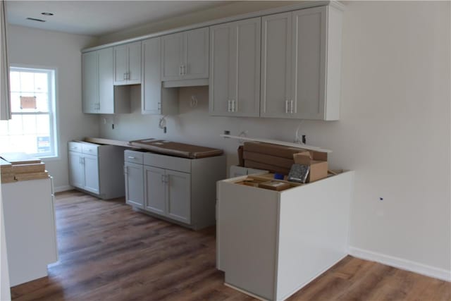 330 Cherokee Dr, Chippewa Twp, PA 15010 - kitchen with wood finished floors and baseboards