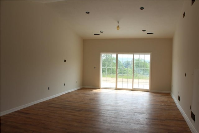 330 Cherokee Dr, Chippewa Twp, PA 15010 - spare room with wood finished floors and recessed lighting
