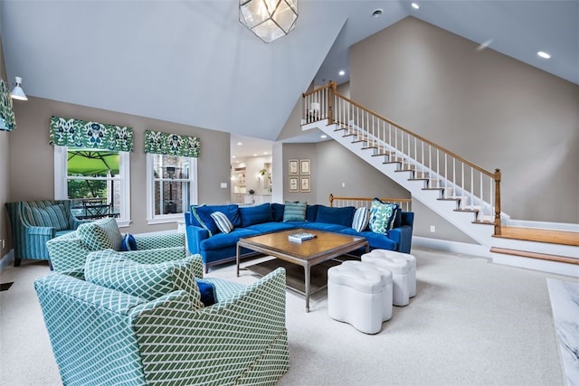 living area featuring high vaulted ceiling, recessed lighting, stairway, carpet, and baseboards