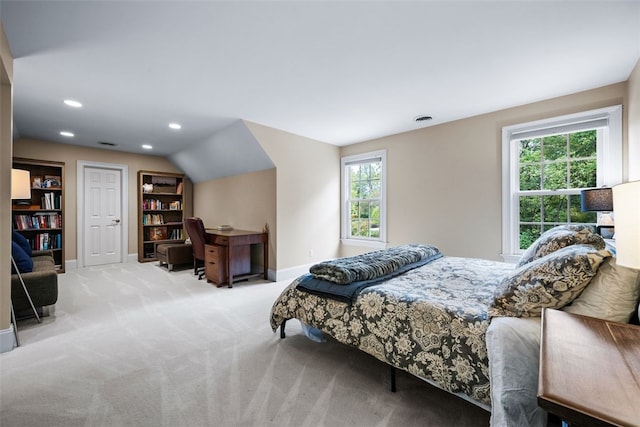 bedroom featuring carpet, visible vents, baseboards, lofted ceiling, and recessed lighting
