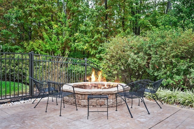 view of patio featuring a fire pit