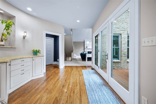 interior space featuring recessed lighting and light wood-style floors
