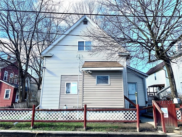 406 Peach St, City Of But Ne, PA 16001 - rear view of house with fence and entry steps
