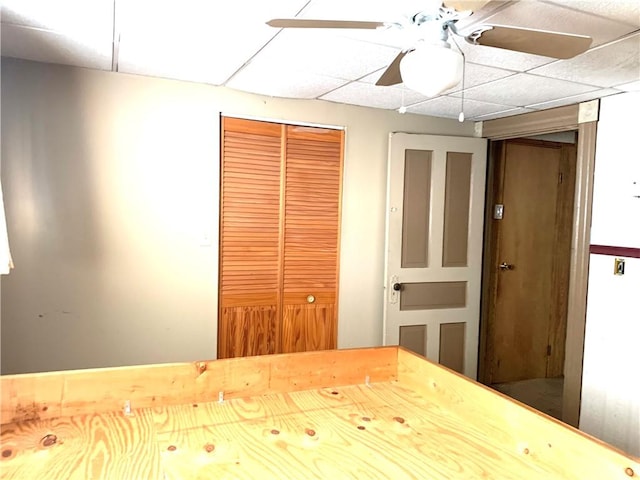 406 Peach St, City Of But Ne, PA 16001 - unfurnished bedroom with a closet, a drop ceiling, and ceiling fan
