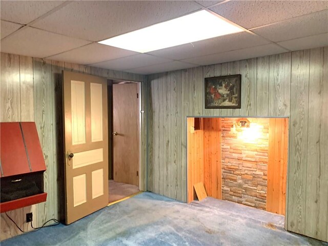 406 Peach St, City Of But Ne, PA 16001 - carpeted empty room featuring a paneled ceiling and wood walls