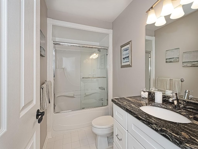 232 Adams Pointe Blvd Unit 6, Adams Twp, PA 16046 - full bathroom featuring vanity, tile patterned flooring, toilet, and shower / bath combination with glass door