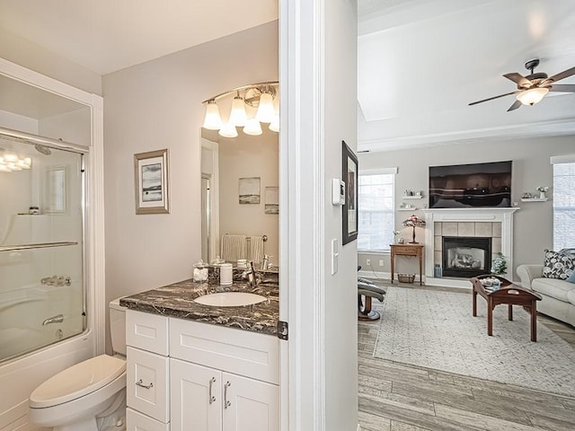 232 Adams Pointe Blvd Unit 6, Adams Twp, PA 16046 - bathroom with vanity, a ceiling fan, healthy amount of natural light, and enclosed tub / shower combo