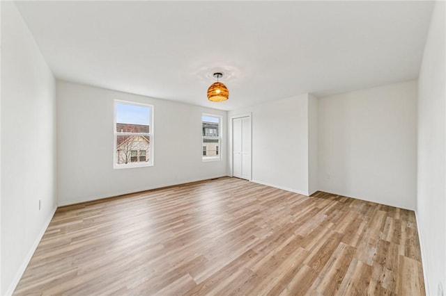 5021 Broad St, Garfield, PA 15224 - empty room with light wood finished floors