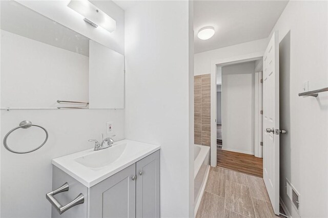5021 Broad St, Garfield, PA 15224 - bathroom with vanity and a tub