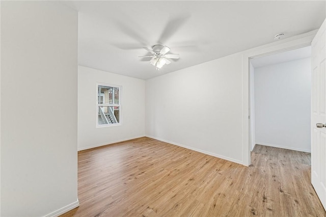 5021 Broad St, Garfield, PA 15224 - spare room with a smoke detector, light wood finished floors, and ceiling fan