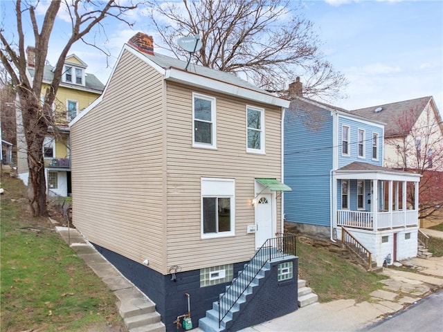 5021 Broad St, Garfield, PA 15224 - view of front of house featuring a chimney