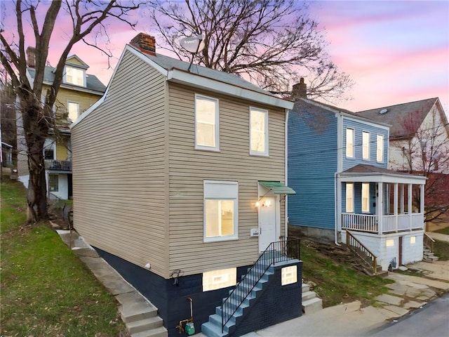 5021 Broad St, Garfield, PA 15224 - view of front of house with a chimney