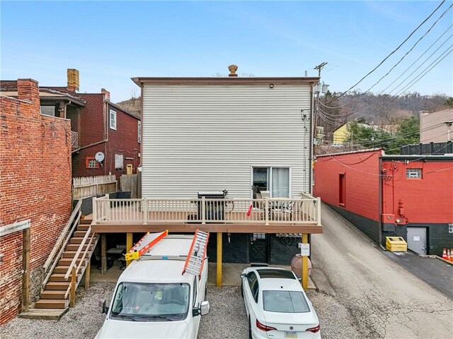621 Butler St, Etna, PA 15223 - back of house with a wooden deck, stairs, and fence