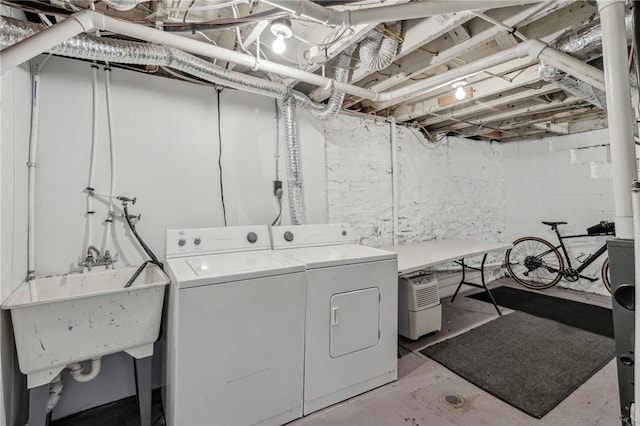 621 Butler St, Etna, PA 15223 - washroom with a sink, laundry area, and washer and clothes dryer