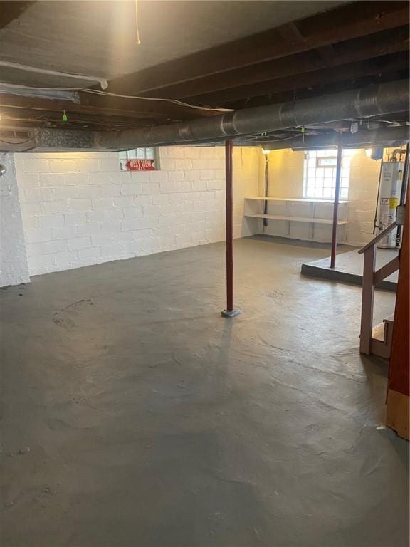 basement featuring stairs