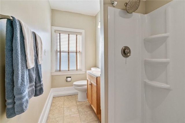 full bathroom featuring baseboards, a shower, vanity, toilet, and tile patterned flooring