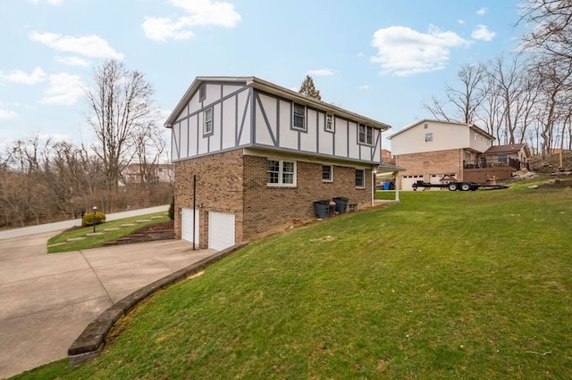 view of property exterior featuring brick siding, a yard, concrete driveway, and a garage