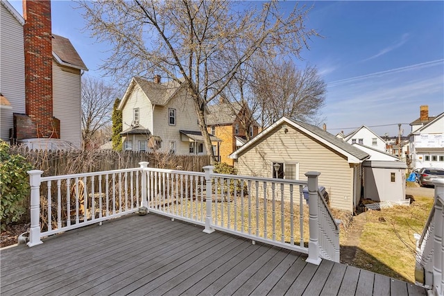 deck featuring a residential view and fence