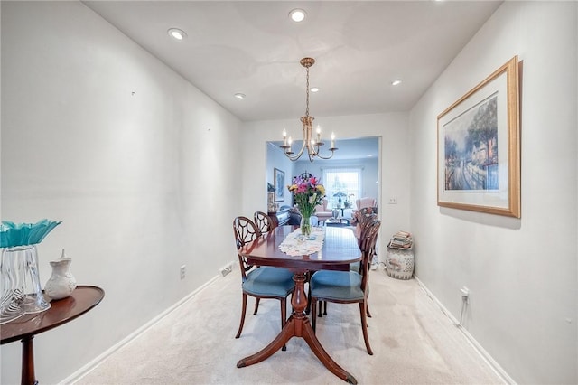 dining room featuring a notable chandelier, recessed lighting, baseboards, and carpet floors