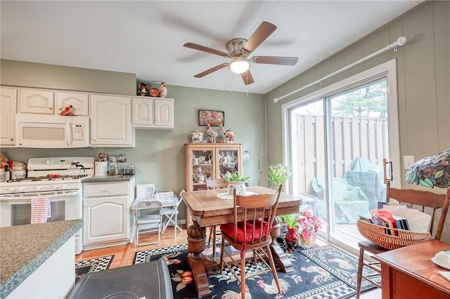 dining room featuring a ceiling fan