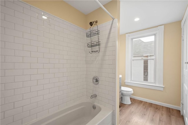 157-159 Grant Ave, Verona, PA 15147 - full bathroom featuring baseboards, toilet, wood finished floors, and washtub / shower combination