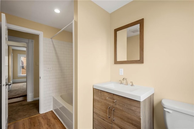 157-159 Grant Ave, Verona, PA 15147 - full bath featuring shower / bath combination, toilet, wood finished floors, and vanity