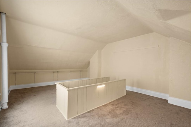157-159 Grant Ave, Verona, PA 15147 - additional living space with baseboards, carpet, and lofted ceiling
