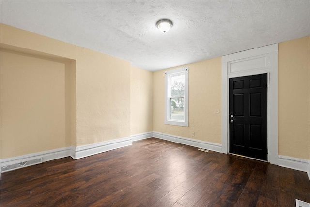 157-159 Grant Ave, Verona, PA 15147 - entryway featuring visible vents, baseboards, a textured ceiling, and hardwood / wood-style flooring