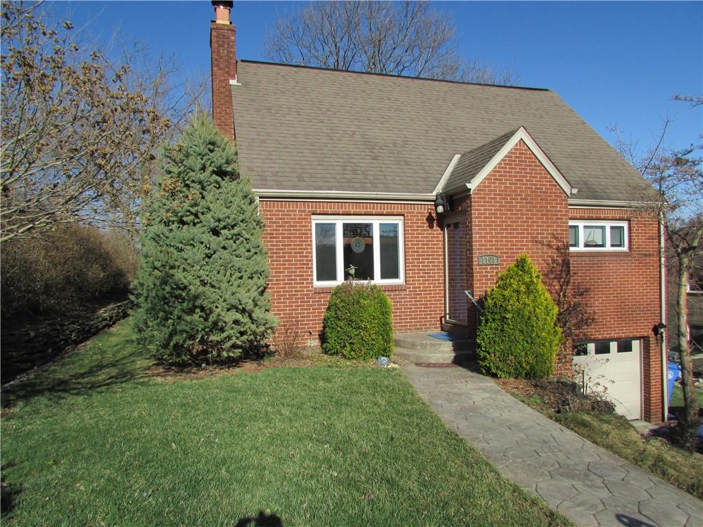 1103 Race St, Castle Shannon, PA 15234 - view of front of property featuring a chimney, a front yard, an attached garage, and brick siding