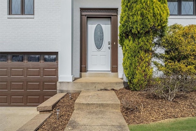 1693 Emery Dr, Mccandless, PA 15101 - property entrance featuring brick siding and a garage