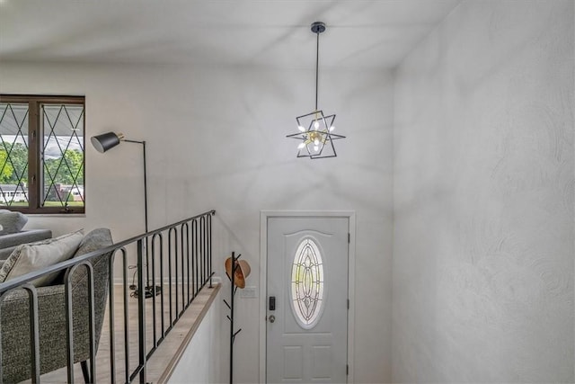 1693 Emery Dr, Mccandless, PA 15101 - foyer entrance with healthy amount of natural light and a chandelier
