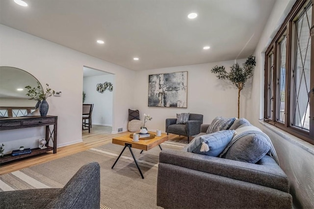 1693 Emery Dr, Mccandless, PA 15101 - living area featuring wood finished floors, recessed lighting, and baseboards