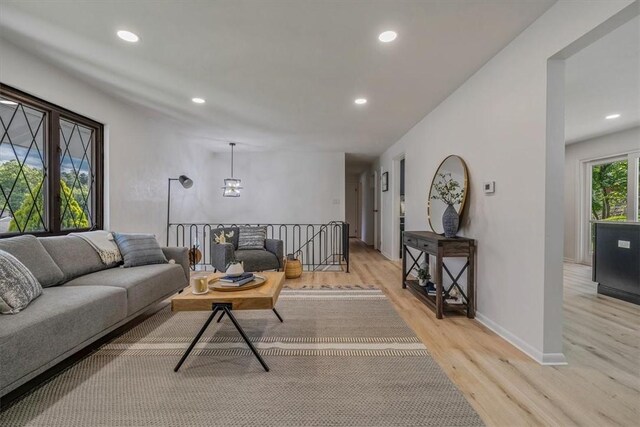 1693 Emery Dr, Mccandless, PA 15101 - living area with light wood-style floors, recessed lighting, a chandelier, and baseboards