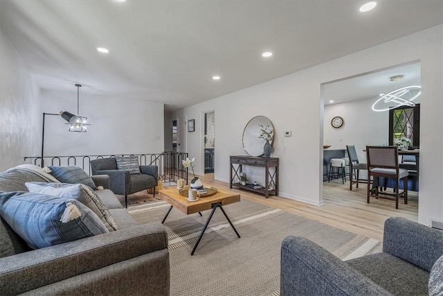 1693 Emery Dr, Mccandless, PA 15101 - living room with wood finished floors, recessed lighting, and a chandelier