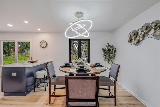 1693 Emery Dr, Mccandless, PA 15101 - dining area with recessed lighting, a chandelier, light wood-style floors, and baseboards