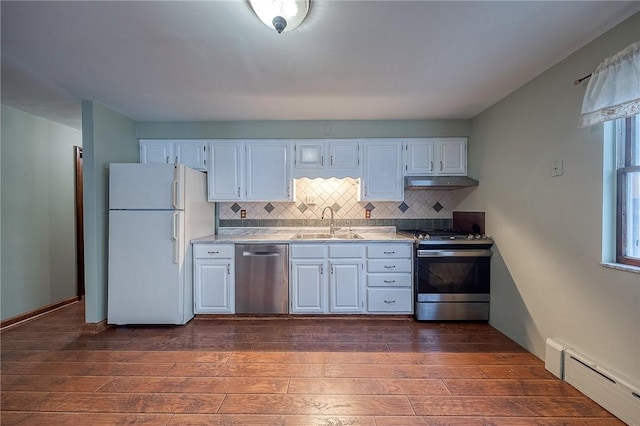 248 Spruceton Ave, Mt Lebanon, PA 15228 - kitchen featuring baseboard heating, appliances with stainless steel finishes, under cabinet range hood, a sink, and light countertops