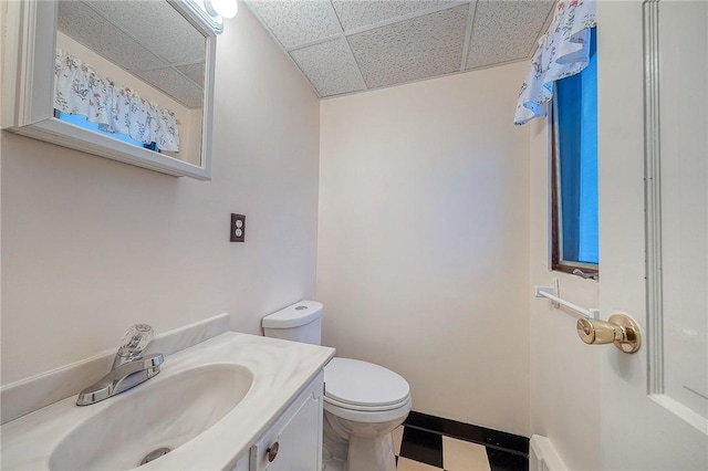 248 Spruceton Ave, Mt Lebanon, PA 15228 - bathroom with toilet, a drop ceiling, vanity, and baseboards