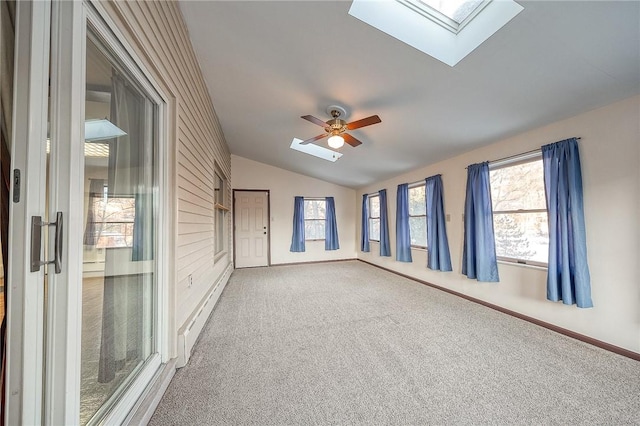 248 Spruceton Ave, Mt Lebanon, PA 15228 - unfurnished room featuring baseboards, a baseboard heating unit, carpet flooring, a ceiling fan, and lofted ceiling with skylight